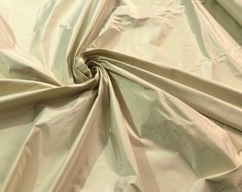 Champagne gold silk taffeta 54" wide    Beautiful iridescent champagne gold color silk taffeta fabric sold by the yard