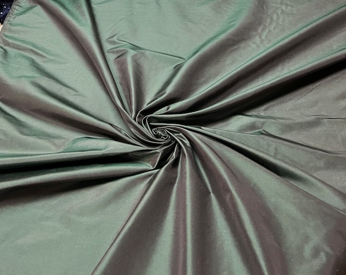 Beautiful grayesh brown Green  Irredescent 100% silk taffeta 54” wide.  Best used for apparel and home Decore.  Sold by the yard