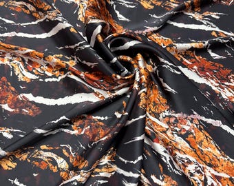 100% silk satin charmeuse digital print 54" wide    Beautiful black base with copper gold abstract design silk fabric 54” wide