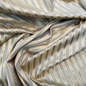 Silk taffeta satin stripe 54" wide                      Sold by the yard     Beautiful shades of gold