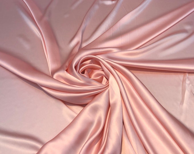 Silk charmouse 45” wide    Beautiful baby pink silk satin charmouse fabric sold by the yard