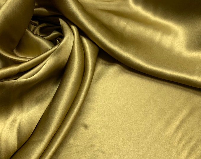 Beautiful majestic gold silk Charmouse 54” wide. Best used for appreal. Sold by the yard