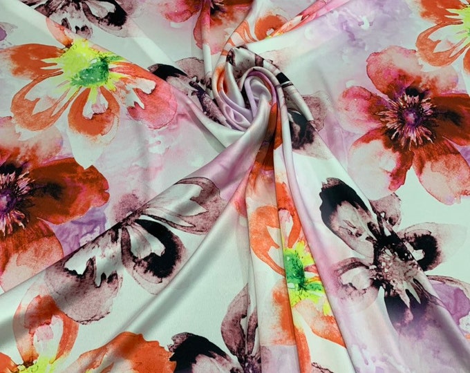 Satin Charmouse digital print 54” wide.  Beautiful ivory base multi color  floral print best used for apparel.  Sold by the yard