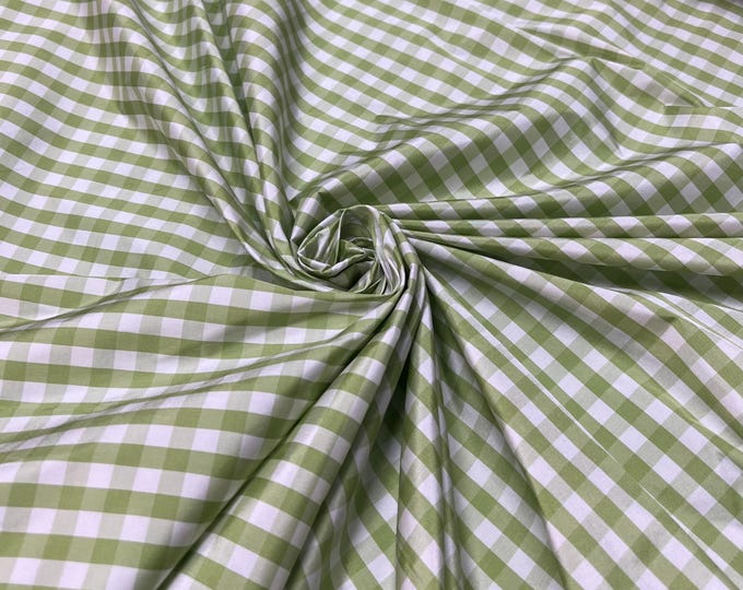 Beautiful taffeta Green & white gingham check 54” wide.  Best used for apparel and home Decore.  Sold by the yard