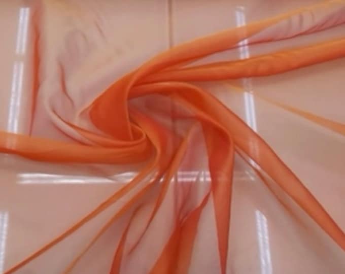 Beautiful Orange mix colors  combination 100% Silk Organza 54” wide. Usable for Apparel and interior Decore.  Sold by the yard