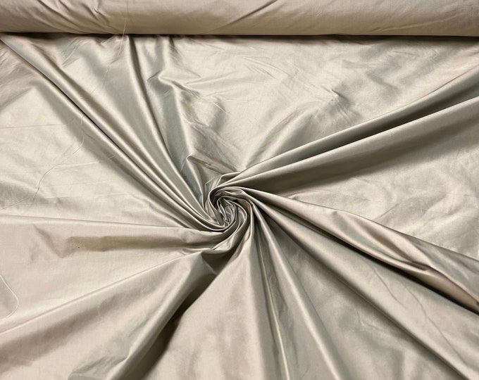 Beautiful olive green Irredescent 100% silk taffeta 54” wide.  Best used for apparel and home Decore.  Sold by the yard