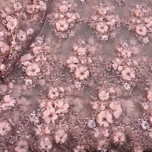 LIGHT PINK HAND BEADED FLORAL DESIGN EMBROIDERY ON A MESH LACE-SOLD BY YARD. main image 1