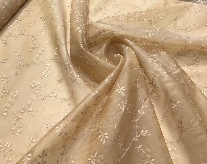 100% silk organza floral embroidery 54" wide   Beautiful gold color     Sold by the yard