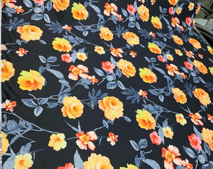 Mikado Zibelline printed fabric 54” wide.  Beautiful black base multi color floral print beat used for apparel. Sold by the yard