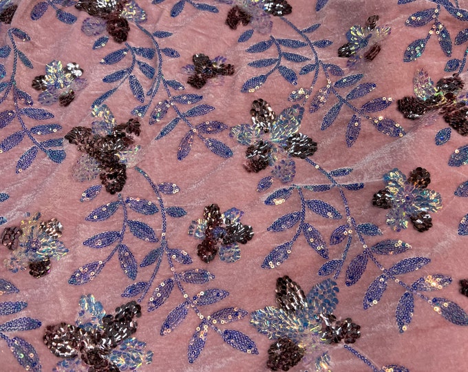 Velvet with sequence embroidered 45" wide   Beautiful mauve pink velvet with floral leaves sequence blue gray. sold by the yard