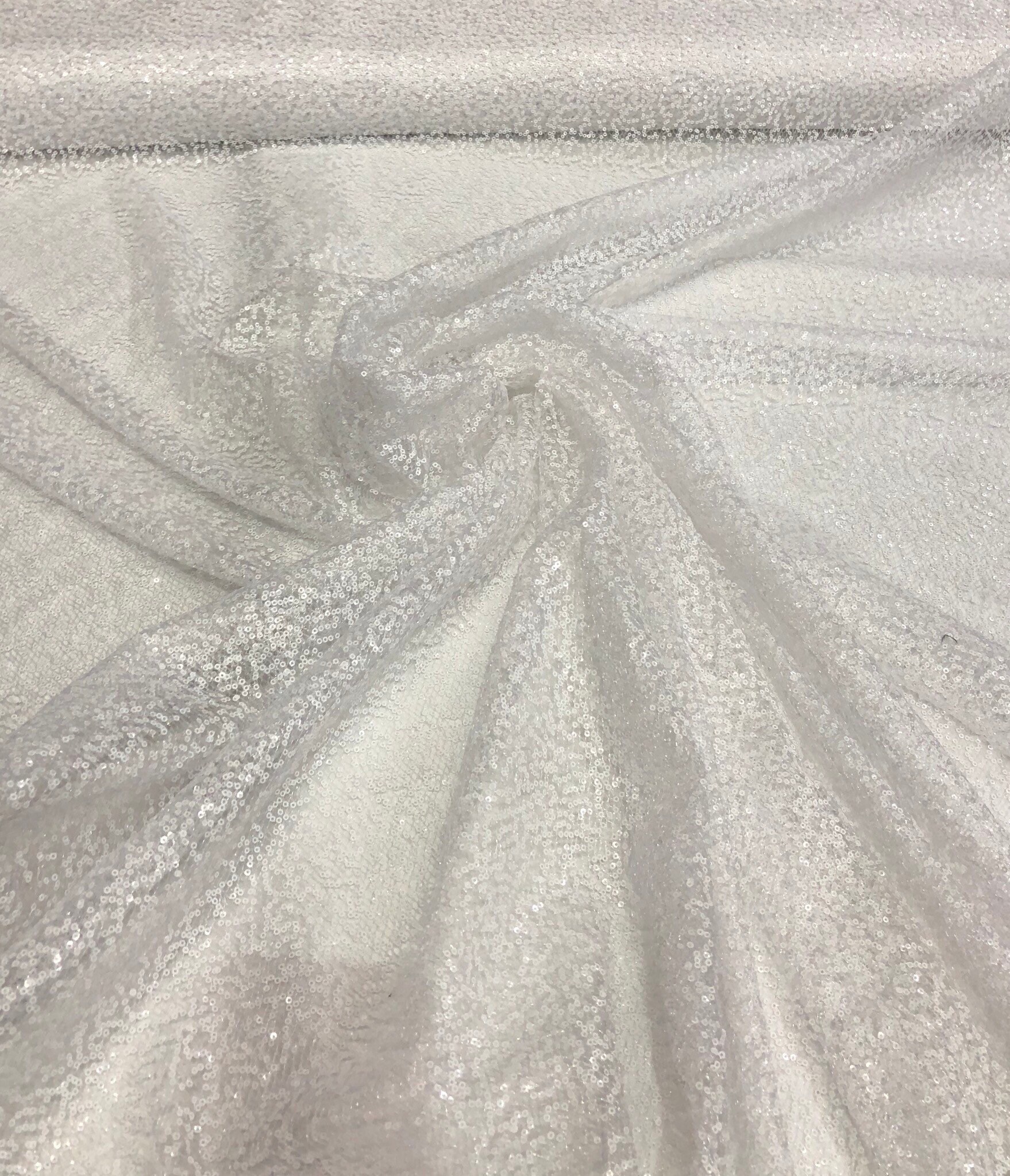 Sequined Swirl Embroidery on Sheer Mesh with Iridescent Highlights and Wave Pattern Detailing