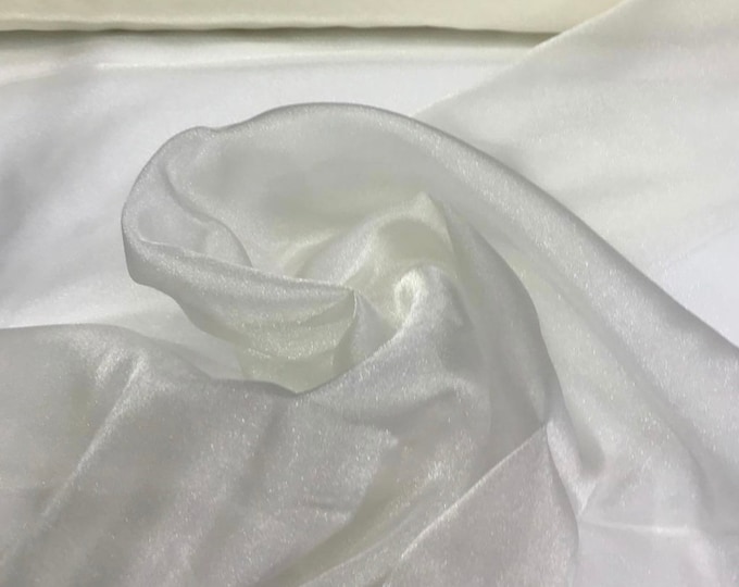 100% polyester ivory crystal organza 45" wide  beautiful ivory color crystal organza fabric sold by the yard