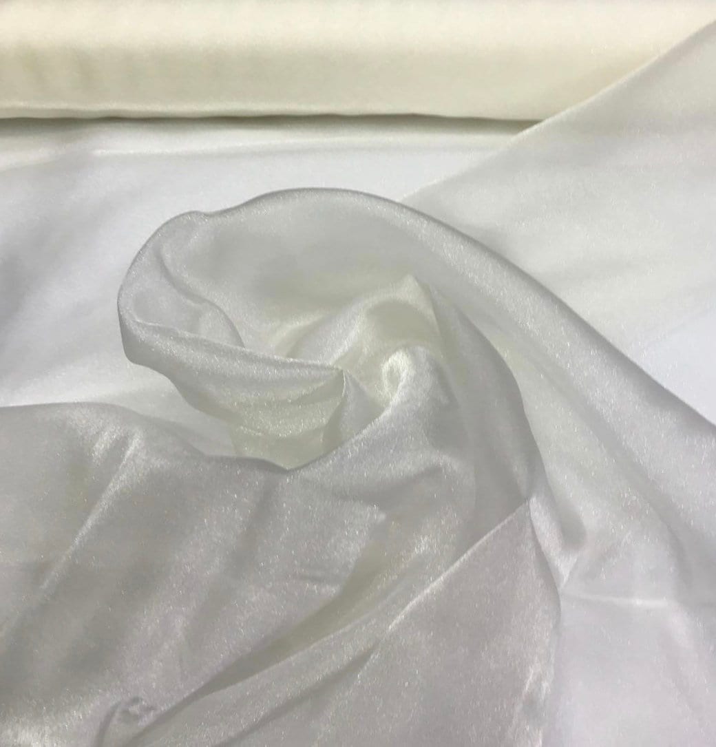 100% polyester ivory crystal organza 45 wide beautiful ivory color crystal  organza fabric sold by the yard