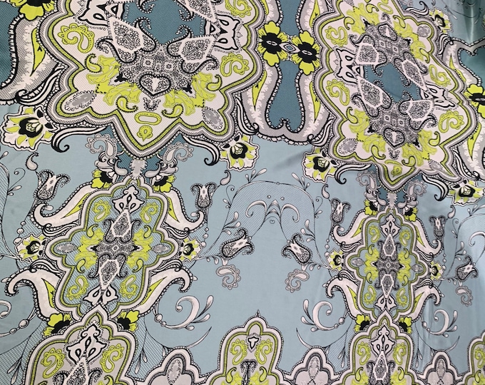 100% silk Charmouse satin print 54” wide.  Beautiful grey base abstract design.    Sold by the yard