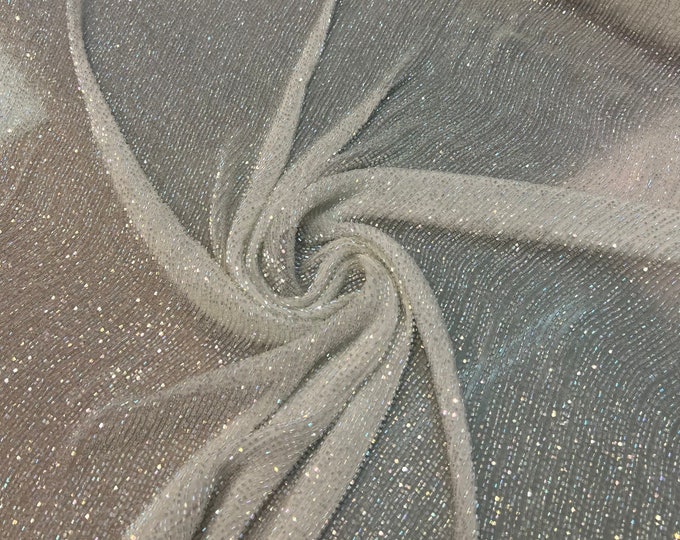Beautiful white on white silk chiffon tiny glass beads hand embroidered shinny glittery clear glass beads  45” wide. Best use for apparel