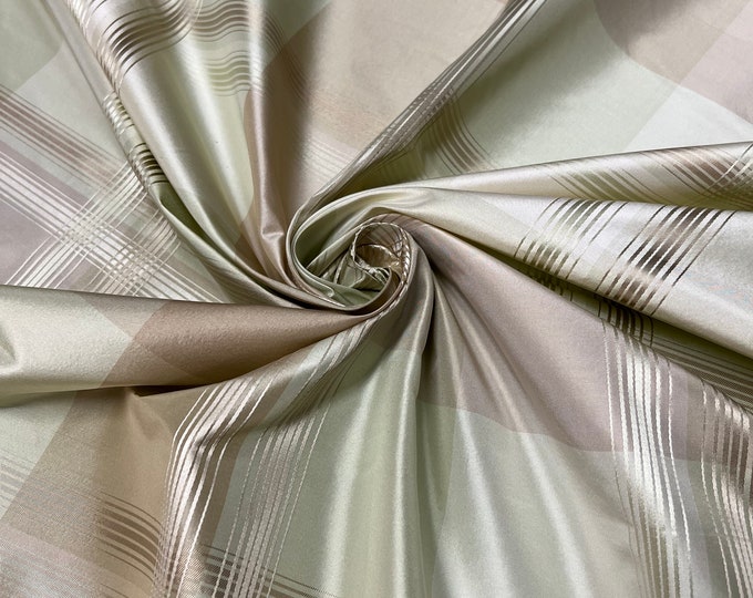 100% silk beautiful mint green tan ivory with gold satin stripe plaids .  silk taffeta 54" wide            Sold by the yard