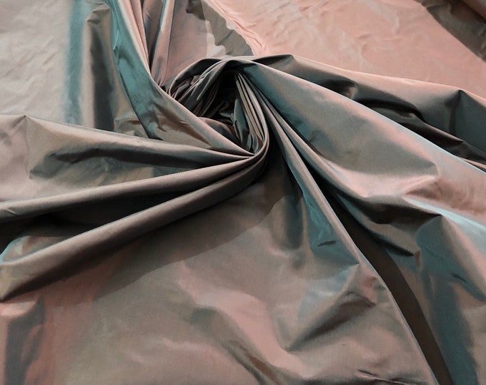 Silk taffeta 54" wide    Beautiful dark steel gray with burnt orange iridescent color silk taffera fabric sold by the yard