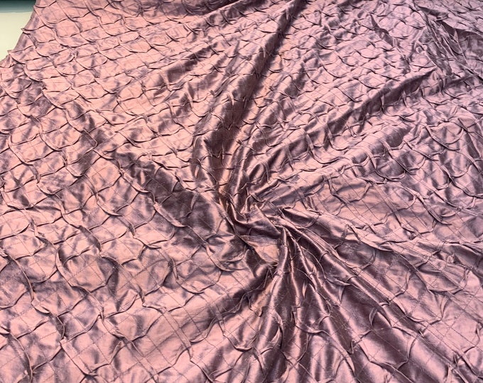Beautiful plum lavender shade pintuck stitches fabric 44” wide.  Best used for apparel & home Decore.  Sold by the yard.