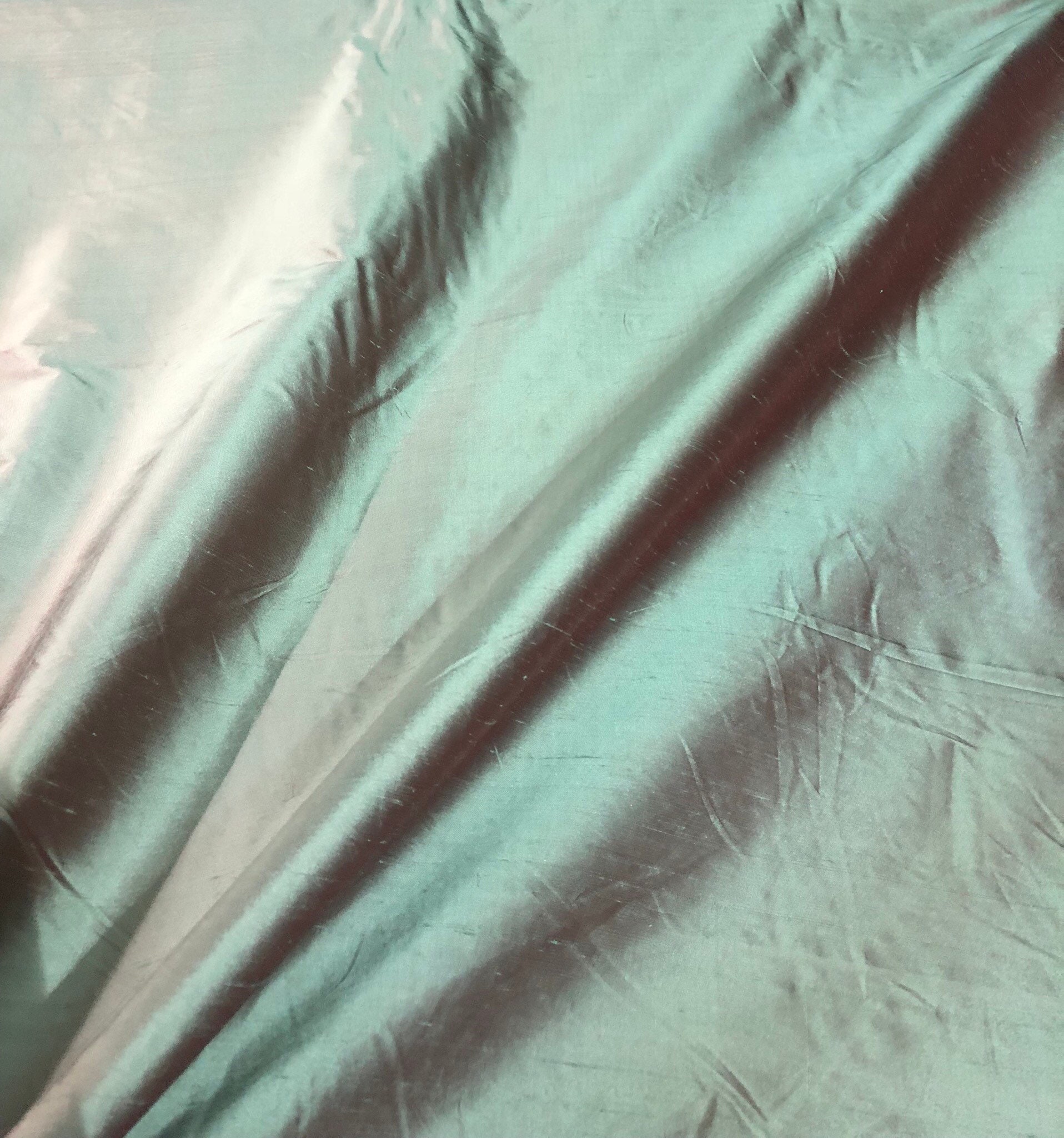 Silk shantung 54 wide Beautiful green with red shade color silk