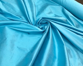 Silk shantung 54" wide   Beautiful aqua blue color  silk shantung fabric sold by the yard