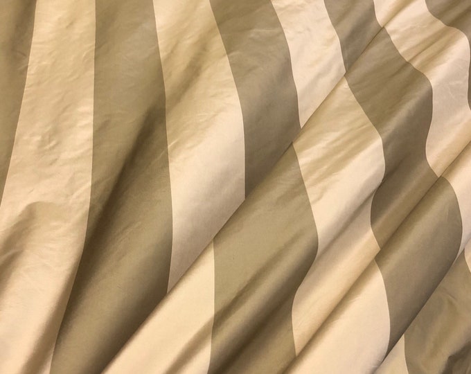 Silk taffeta stripe 54" wide     Sold by the yard       Color: light gold & tan gold
