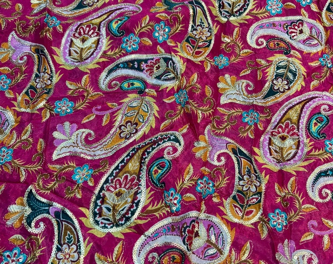 Bright Fusia pink base with multi color print 46”wide    Beautiful artistic design Pasely style sequenced embroidered viscose soft chiffon.