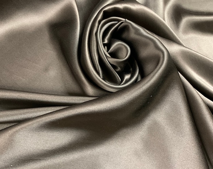 Beautiful dark brown 100% silk satin Charmouse 54” wide. Best used for apparel. Sold by the yard