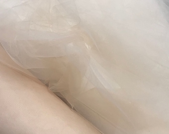 Soft tulle mesh fabric 60" wide. Best usable for bridal viel, bridal gowbs, evening dress and much more.....