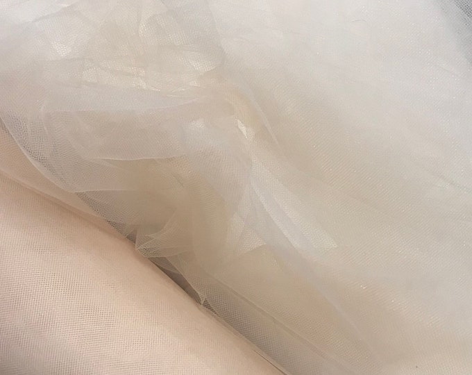 Soft tulle mesh fabric 60" wide. Best usable for bridal viel, bridal gowbs, evening dress and much more.....