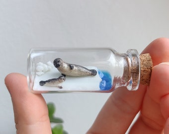 seal with cute little baby-seal in a glass-bottle / unique miniature figure/ handmade artwork