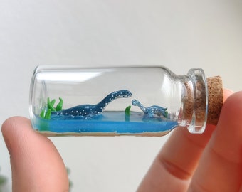 little plesiosaurus with baby in a glass-bottle / unique miniature figure szene/ handmade artwork
