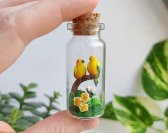 two little sun conures surrounded by flowers in glass-bottle / unique miniature figure/ handmade artwork