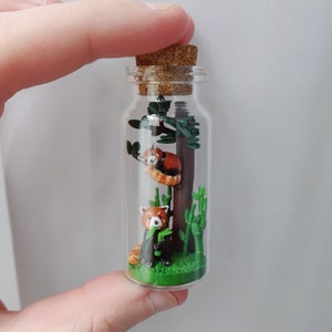 two cute red pandas in glass-bottle / unique miniature figure/ handmade artwork