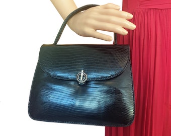 Black 1960s reptile leather handbag with silver enamelled clasp and top handle