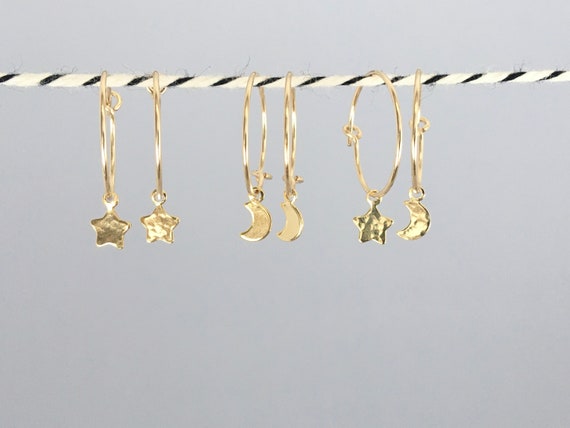 14k Gold-plated Hoop Earrings with Dangling Moon and Star Charms 14k Gold-plated Hoop Earrings with Dangling Moon and Star Charms