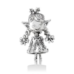 May include: A silver charm in the shape of a girl elf with a floral crown, wearing a dress with a floral pattern and holding flowers in her hands.