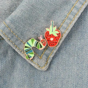 The Very Hungry Caterpillar and Strawberry pin badge set image 3