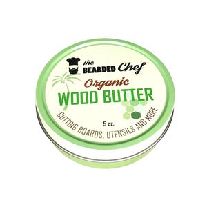 May include: A set of three ceramic canisters with lids, featuring a geometric pattern in shades of blue, white, and gray. The canisters vary in size, with the largest approximately 8 inches tall.