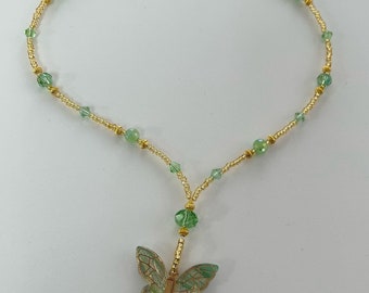 Green Bead Necklace with a Butterfly Pendant