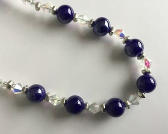 A sparkly dark blue necklace