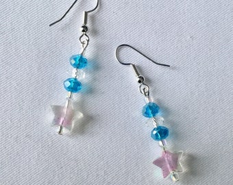 Blue sparkle bead and star dangly earrings.