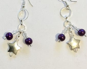 Dangly purple bead star earrings