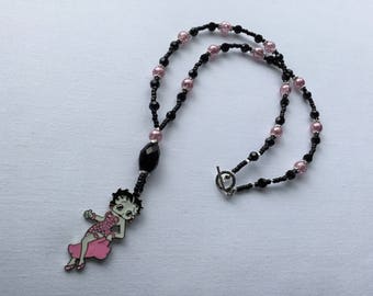 Black and pink beaded necklace with a Betty boop pendant