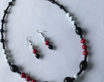 Black, red and white bead necklace and earring set