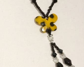 Yellow and black butterfly pendant necklace