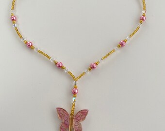 Pink Beaded Necklace with a Butterfly Pendant
