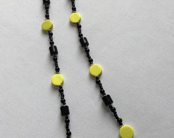 Bright yellow and black beaded necklace
