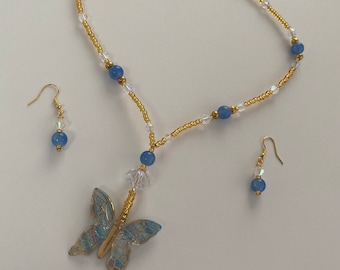 Blue Beaded Necklace with a Butterfly Pendant and Earrings