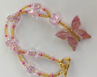 Pretty Pink Glass Bead Necklace with a Butterfly Pendant