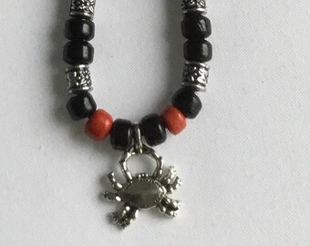 Crab pendant long thong beaded necklace